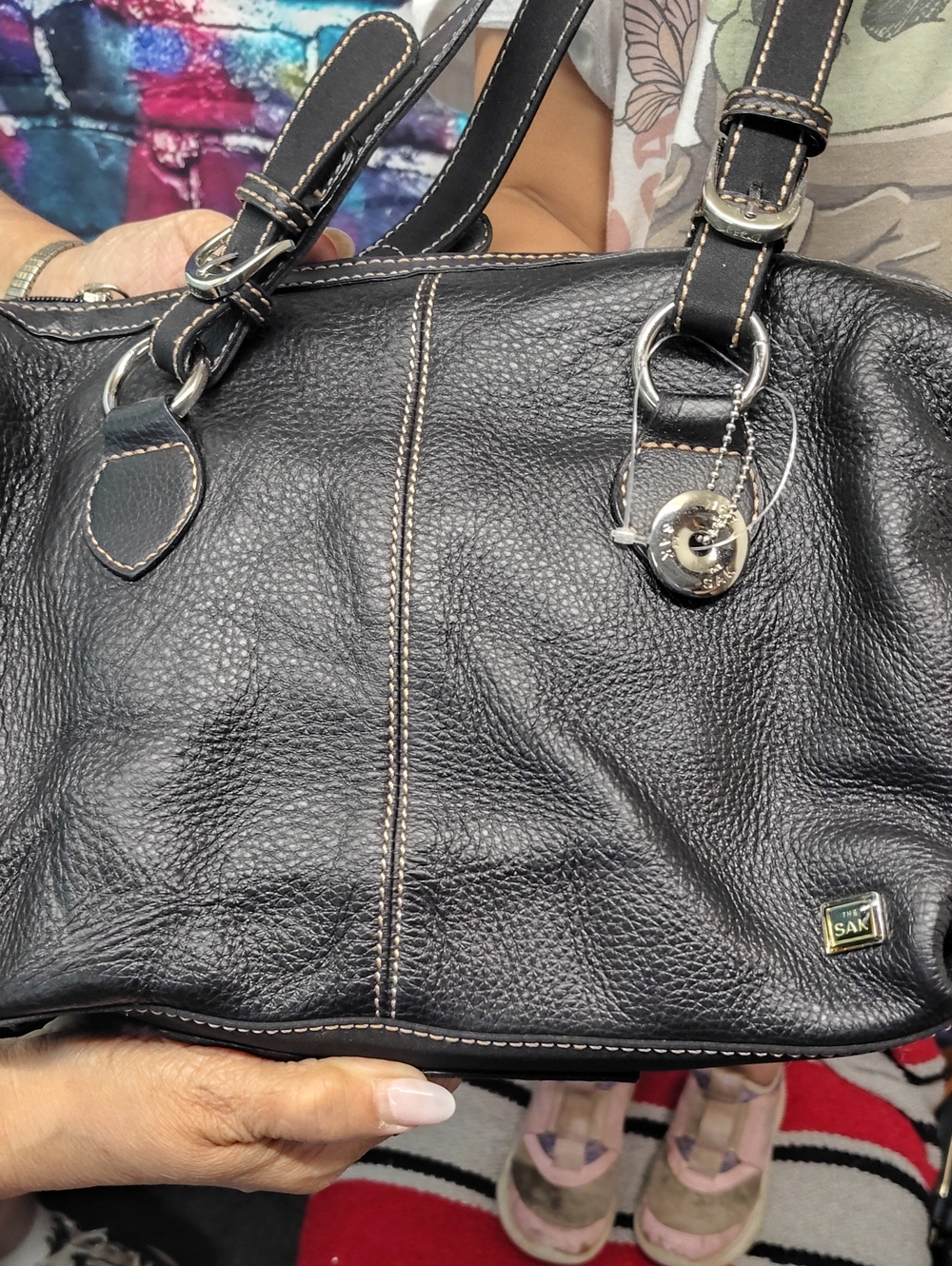 The Sak Black Pebbled Leather Shoulder Bag with Silver Charm